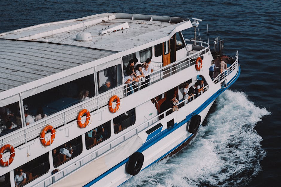A bustling ferry carrying passengers across the Bosphorus in Istanbul, showcasing vibrant daily life.