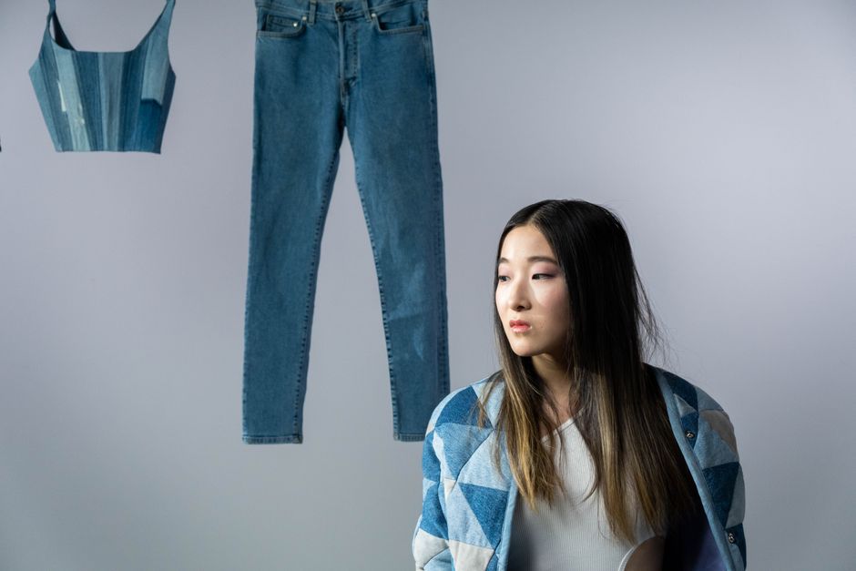 Portrait of a woman with denim clothes, showcasing contemporary fashion style.
